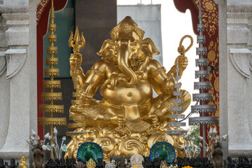 Fototapeta premium The Ganesha Shrine, located in front of Central World in Bangkok, Thailand, is considered a master of intellect and wisdom who praying to be blessed for Luck and Success