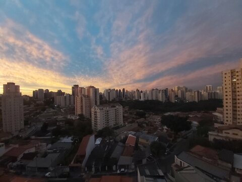 Beautiful sunrise, blue cloudy sky at downtown Sao Paulo
