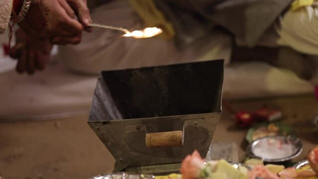 Slow Motion shot of Fire,Agni havan kund,Indian Havan Kund, rituals of hindus yagya at an Indian Wedding Function in New Delhi,India
