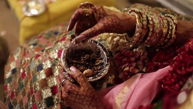 Slow Motion shot of Fire,Agni havan kund,Indian Havan Kund, rituals of hindus yagya at an Indian Wedding Function in New Delhi,India
