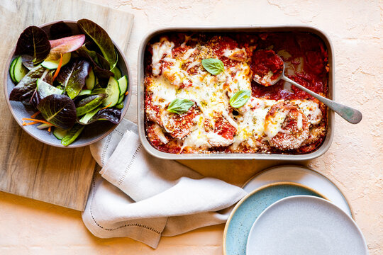 Baked casserole dish with eggplant, cheese, tomato