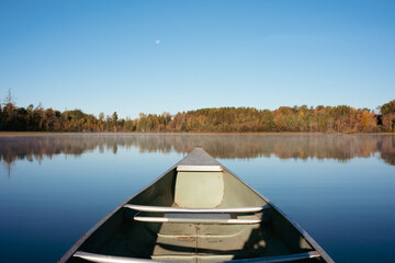 Canoe on calm lake