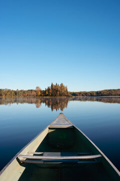 Canoe on smooth calm lake