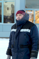 Close-up portrait of a worker at a construction site