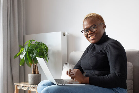 freelancer, professional woman looking at camera, smile