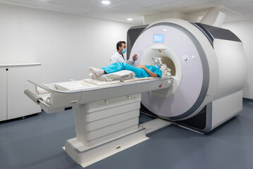 Doctor doing MRI scan for patient