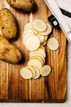 Sliced Potatoes on a cutting board