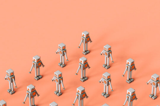 Toy robots in different positions on a pink background