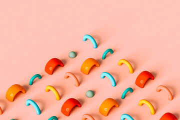 Abstract colorful shapes on pink background