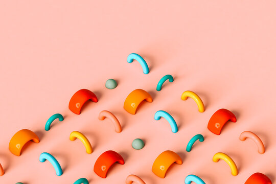 Abstract colorful shapes on pink background