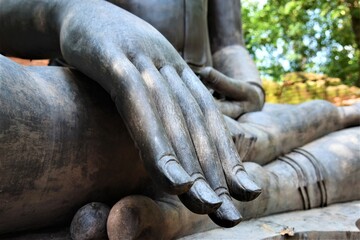 closeup hand  of buddha statue