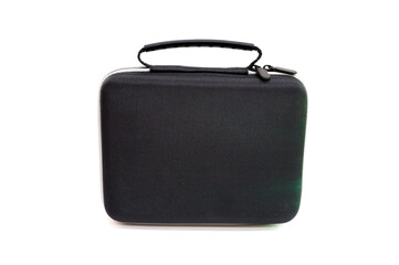 A small black zipper bag with a handle and a green sheen on a light background