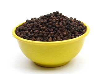 Black peppers in a bowl 