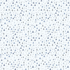 Doodle triangles in pastel palette seamless pattern, geometric simple shapes on light blue background. Design for printing on textiles, wallpaper, wrapping paper