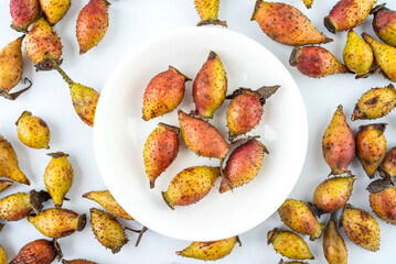 Fresh Chinese herbal medicine golden cherry on white background