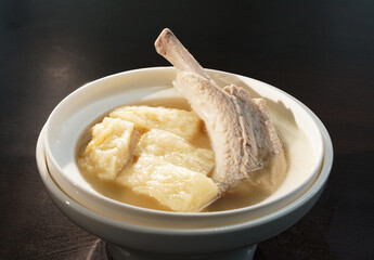 cook seafood lobster with pork ribs spare in hot herbal soup clay pot chinese menu