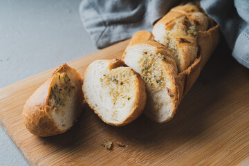 Freshly baked homemade bread with crispy crust and garlic