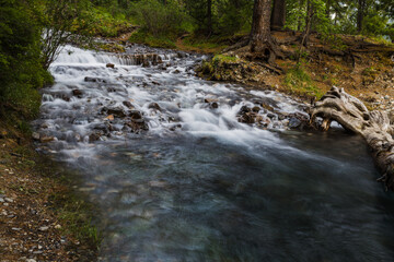 beautiful mountain stream with crystal clear water