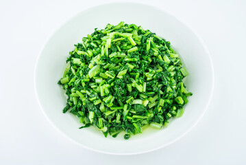 A plate of vegetables stir-fried radish sprouts
