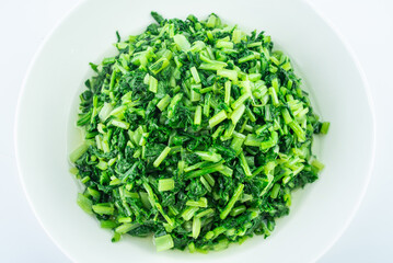 A plate of vegetables stir-fried radish sprouts