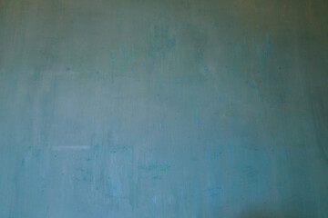 Texture green facade wallpaper in concrete wall background