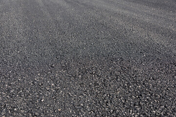 Asphalt road low angle pavement background view