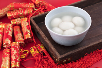 Boiled dumplings and firecracker decoration for Chinese Lantern Festival