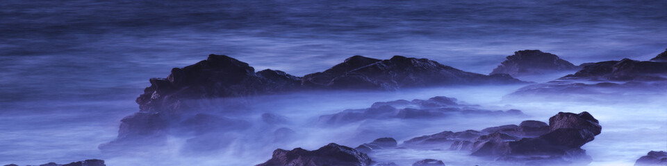 Fototapeta premium Water with rock nature photo with long exposure fog effect abstract color ocean background 