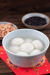 Fototapeta na wymiar Food dumplings and red envelopes for the traditional Chinese festival Lantern Festival