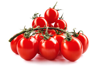 Branch of ripe red tomatoes isolated on white background.