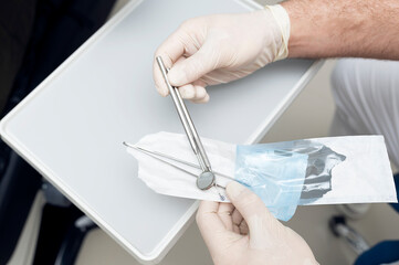 Dentist prints dental instruments.