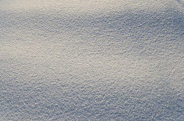 Pure white snow, texture. Shadows on the snow cover.