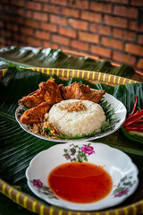 Chicken Glutinous Rice also known as Pulut Ayam. Normally eaten with fried chicken.
