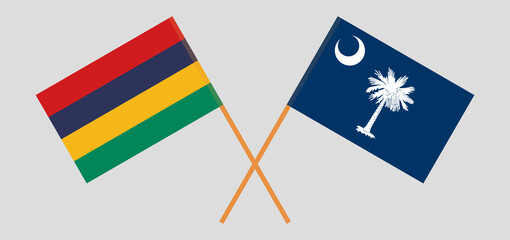Crossed flags of Mauritius and The State of South Carolina. Official colors. Correct proportion