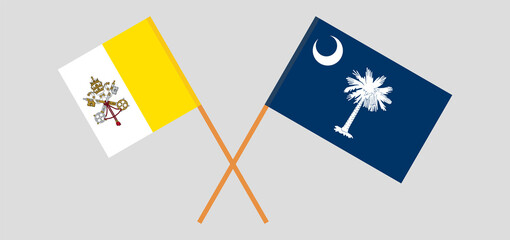 Crossed flags of Vatican and The State of South Carolina. Official colors. Correct proportion