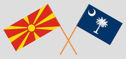 Crossed flags of North Macedonia and The State of South Carolina. Official colors. Correct proportion