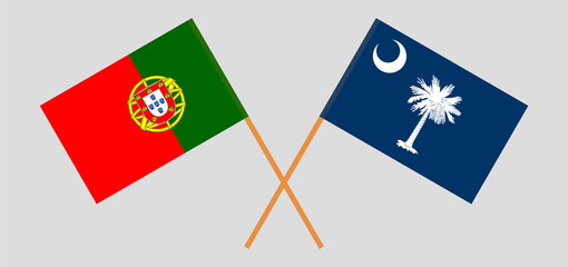 Crossed flags of Portugal and The State of South Carolina. Official colors. Correct proportion