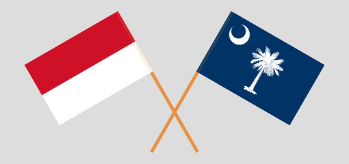 Crossed flags of Indonesia and The State of South Carolina. Official colors. Correct proportion