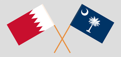 Crossed flags of Bahrain and The State of South Carolina. Official colors. Correct proportion