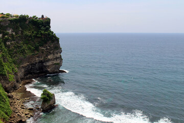 Crashing waves around Uluwatu in Bali. Taken January 2022.