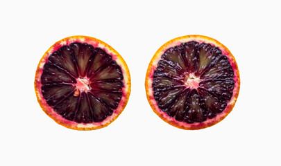 Two half sliced of blood orange isolated on white background