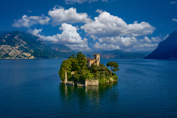 Castle of the Loreto Island drone view. Aerial view of Loreto island, Lake Iseo, Italy. Top view of...