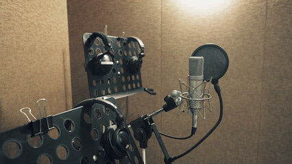 Microphone with pop filter and shock mount anti-vibration and note stand and tripod in music score studio production