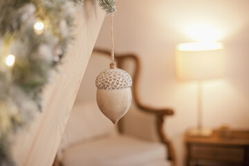 wooden acorn decoration closeup at home with cozy lighting - home lodge chalet details of interior....