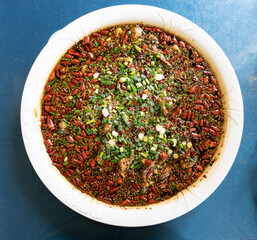 Delicious spicy boiled fish on the plate