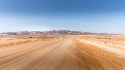 Endless gravel roads to Cape Cross, Namibia.	