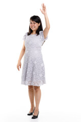 Portrait studio cutout isolated full body shot of Asian young happy trendy female model in beautiful gray lace dress standing posing holding hand on waist smiling look at camera on white background