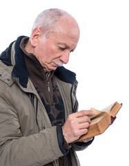 Elderly man reading holy bible