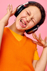 beautiful woman grimace headphones entertainment emotions music Lifestyle unaltered