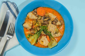 Thick chiken soup with spicies, vegetables and herbs.
